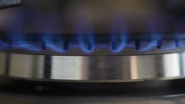 Natural gas inflammation in stove burner, close up view — Stock Video