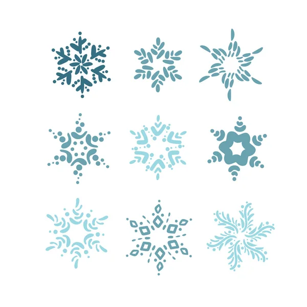 Set van met de hand getrokken blauwe kerst vintage Scandinavische sneeuwvlokken. Kerst decoratief design element in retro stijl, geïsoleerde winter vector illustratie — Stockvector