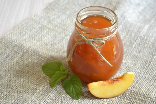 Homemade peach or apricot jam in a jar