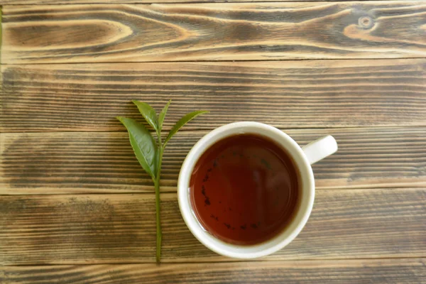 Чайные Листья Чай Чашке Деревянном Фоне Концепции Чая — стоковое фото