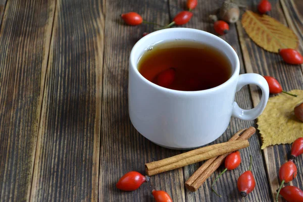 Autumn Composition Rose Hips Nuts Leaves Cup Tea Cup Tea — Stock Photo, Image