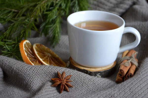 Cup Lemon Tea Dried Oranges Cinnamon Fir Branch Winter Holidays — Stock Photo, Image