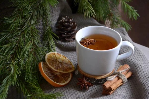 Cup Lemon Tea Dried Oranges Cinnamon Fir Branch Winter Holidays — Stock Photo, Image