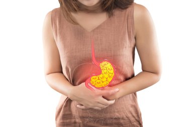 Woman suffering from indigestion or gastric. clipart