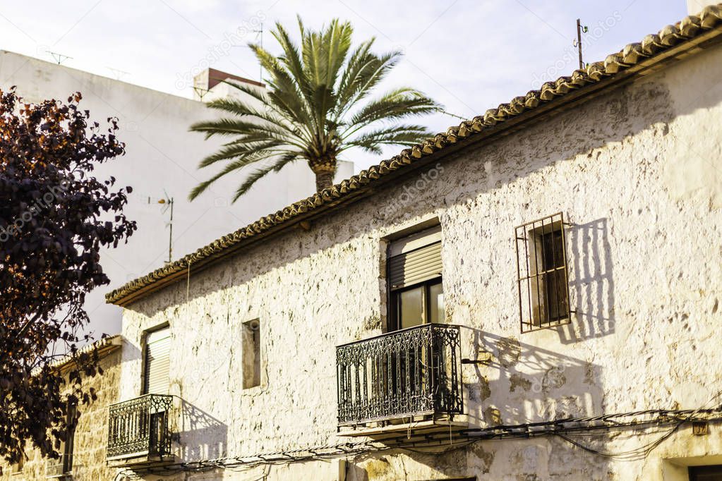 Mediterranean architecture in Spain. Cozy streets of the old town of Xavia or Javea