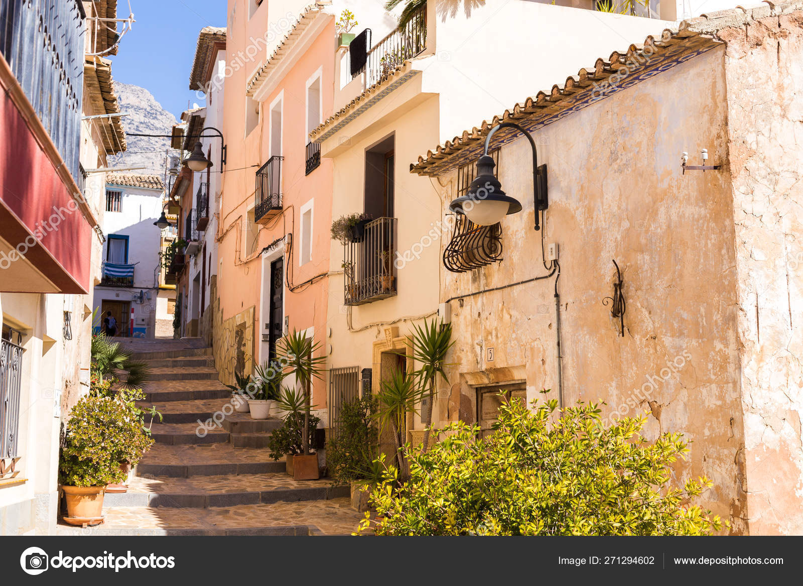 Finestrat Alicante Spain 23 February 2019 Narrow Street In The Old Town With Colored Houses With Shabby Plaster And Cobblestone Stairs Stock Editorial Photo C Selinairina 271294602