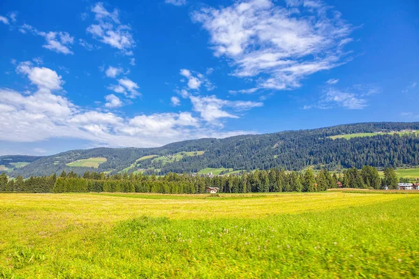 hillside near the village in the summer 