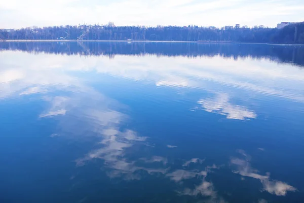 blue sky reflection in deep water