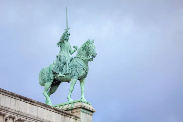 Statue of knight on horses on Sacre Coeur cathedral in Paris