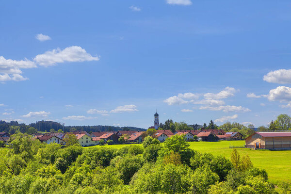 German village with green field
