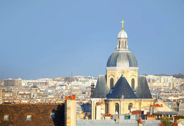 View of Paris Rooftops and Church Cupola . Paroisse Saint-Paul Saint-Louis Church in Paris