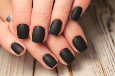 modaya uygun doku arka plan üzerinde göz alıcı güzel manikür