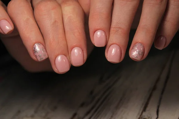 beautiful fashion manicure with a design on long nails
