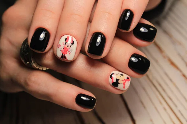 beautiful fashion manicure with a design on long nails