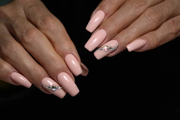 glamorous manicure design on trendy textural background