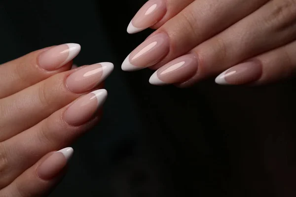 Closeup photo of a beautiful female hands with elegant manicure — Stock Photo, Image