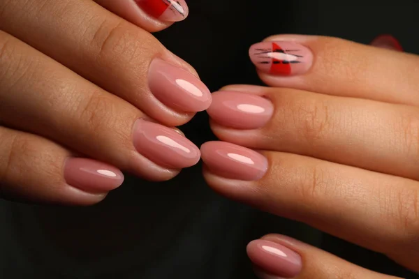 Glamorous beautiful manicure on a trendy texture — Stock Photo, Image