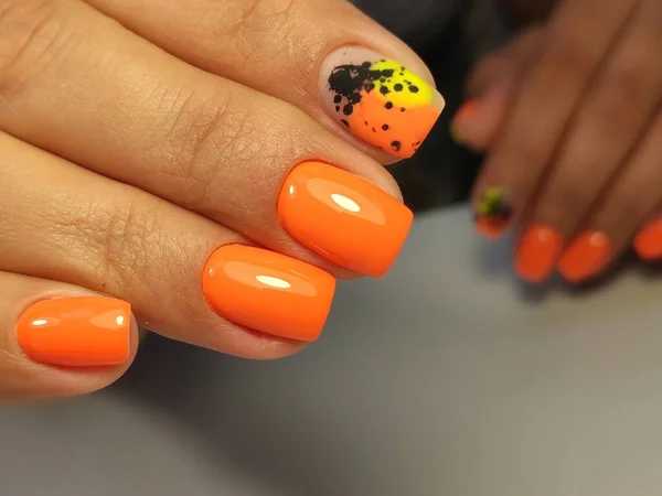 Beautiful nail design on female hands on background. 2019