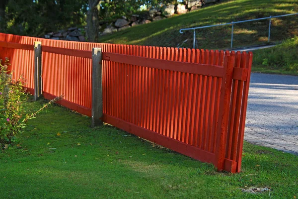 Painted Fence Asphalt Road Lit Rays Sun — Stock Photo, Image