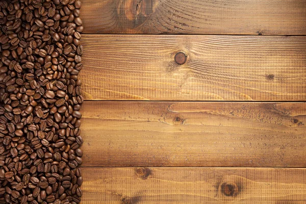 Koffiebonen Houten Achtergrond Bovenaanzicht — Stockfoto