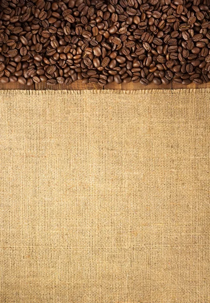 Kaffebønner Sæk Hessian Burlap Kulisse Træ Baggrund Top View - Stock-foto