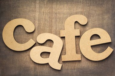 Kafe harflere eski ahşap arka plan, üstten görünüm