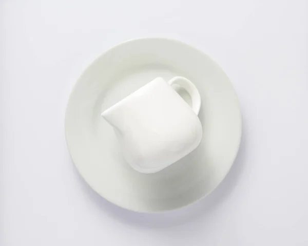 Empty Cream Jug Plate White Background Top View — Stock Photo, Image
