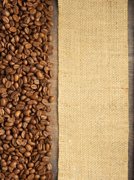 Koffiebonen Houten Tafel Achtergrond Bovenaanzicht — Stockfoto