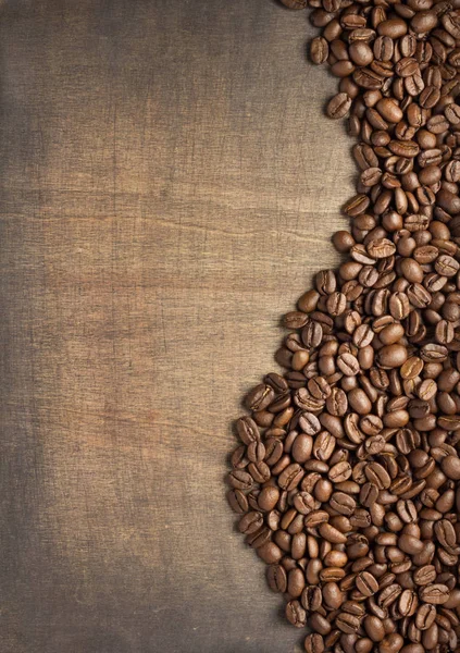 Kaffeebohnen Auf Holztischhintergrund Draufsicht — Stockfoto