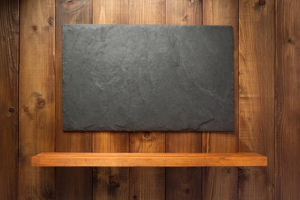 Slate stone på trä bakgrund — Stockfoto