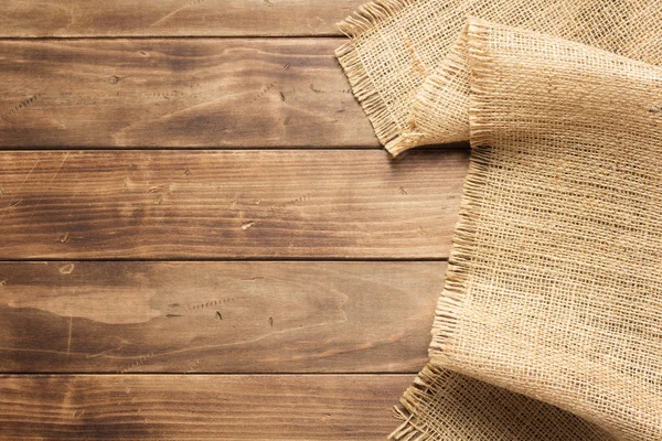 Burlap hessische Säcke auf Holzgrund — Stockfoto