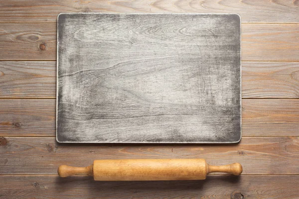 Wooden sign board and rolling pin — Stock Photo, Image