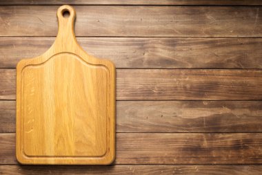 Ahşap tahta tahta arka planda pizza kesme tahtası