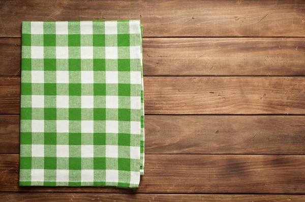 Cloth napkin on at rustic wooden plank — Stock Photo, Image