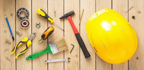 Set of tools and instruments at wooden background — Stock Photo, Image