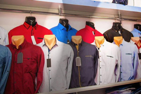 Shirt on mannequins in  men\'s clothing store. Stylish clothes for sale