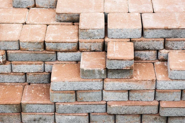 The texture of the tiles for laying the pavement. Blocks for laying the sidewalk, stacked