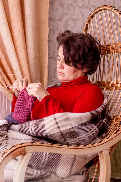 Middle Aged Woman Sits Rocking Chair Woman Knitting Socks — Stock Photo, Image