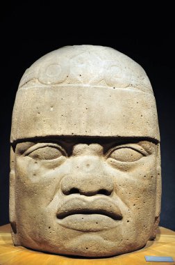 Olmec colossal head from the pre-Columbian heritage of Mexico in Mexico City, Mexico. clipart