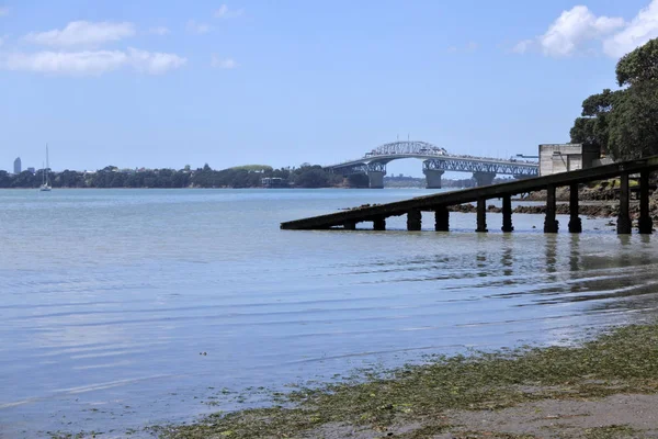Landscape view of Auckland Harbor Bridge from Herne Bay in Auckland New Zealand