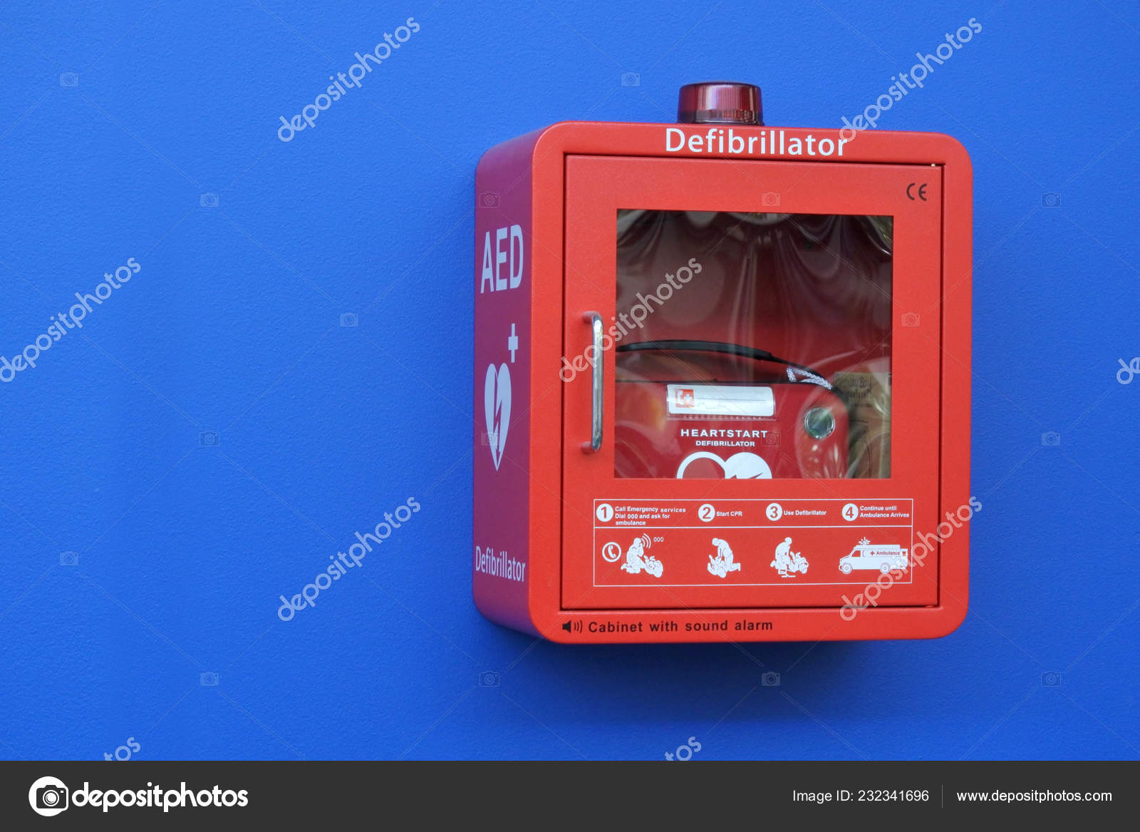 Red Box Defibrillator Cabinet Blue Wall