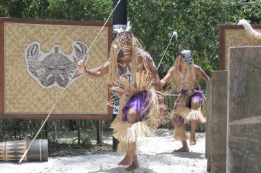 Torres Strait Islander men dancing traditional dance . The Torres Strait islands located between the tip of Cape York in Queensland Australia and Papua New Guinea. clipart