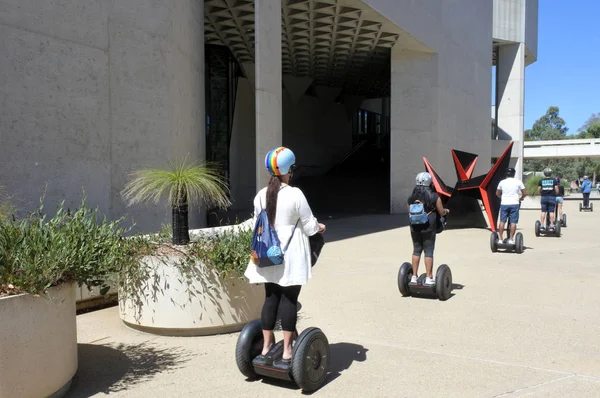 Tourist riding  on Segway outside the National Gallery of Austra — Stock Photo, Image
