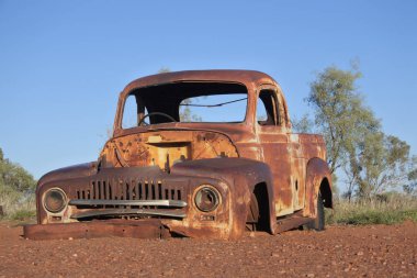 Abandoned old car in the Northern Territory outback Australia clipart