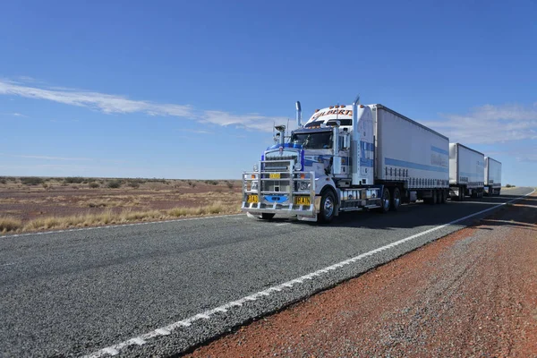 Road train driving in central Australia Outback — Stock Photo, Image