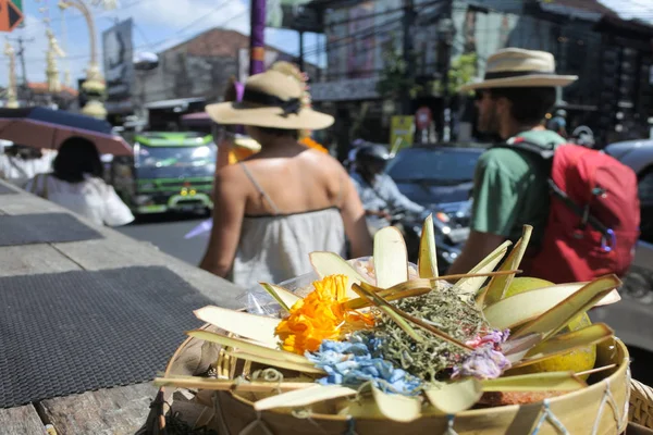 Hindu religion offering against tourist traffic in Ubud  Bali In — Stock Photo, Image