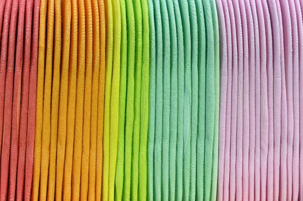 Colorful selection of socks fabric in rainbow colors.
