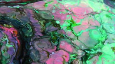 Ağır çekim makro soyut desen sanatsal kavram petrol yüzey sanat tasarım sıçramasına yüzey sıvı boya hareketli