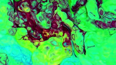 Bu video, yavaş çekimde yayılan koyu renkli boya karışımının aşırı yakın çekim görüntülerini içeriyor. Hareket grafiklerinde bileşik element olarak ve özel görsel efektlerde organik arka plan olarak kullanılabilir.