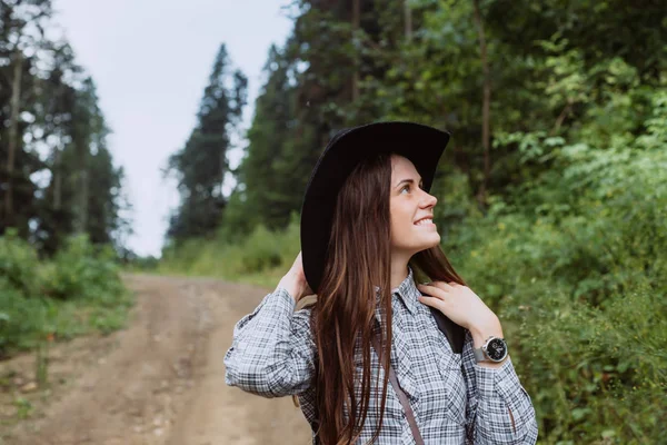 Woman Traveler Smiles Looks Wonderful Forest Concept Travelers Place Text — Stock Photo, Image